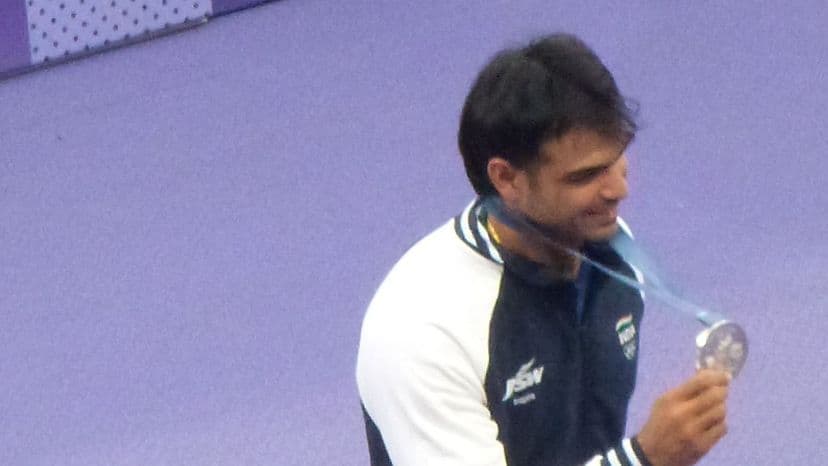 Neeraj Chopra with his silver medal from the men's javelin throw at the Paris 2024 Olympics